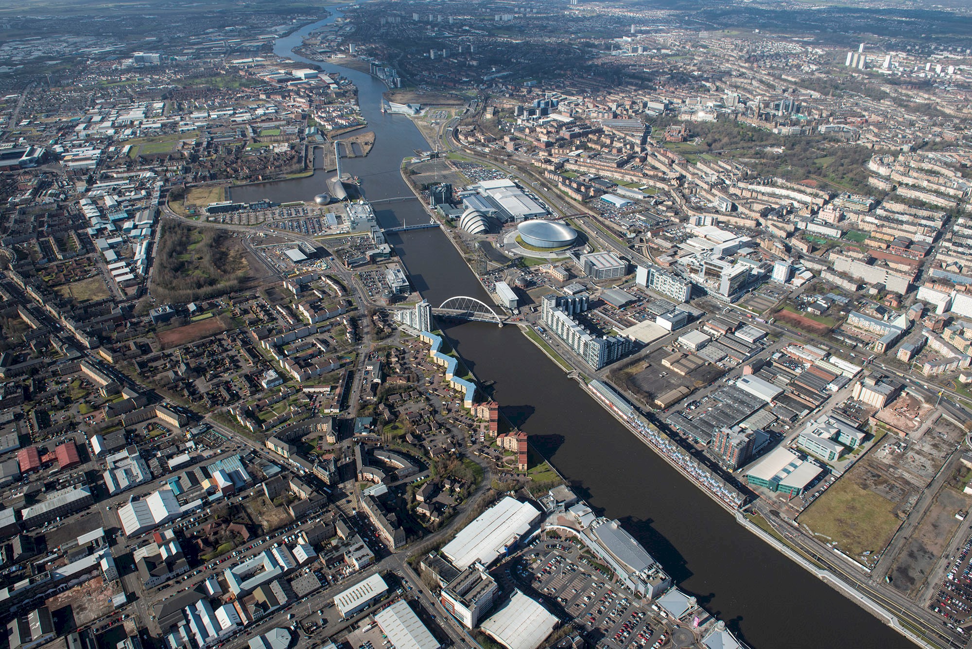 Aerial view over Glasgow showing the River Clyde, SSE Armadillo and Hydro 